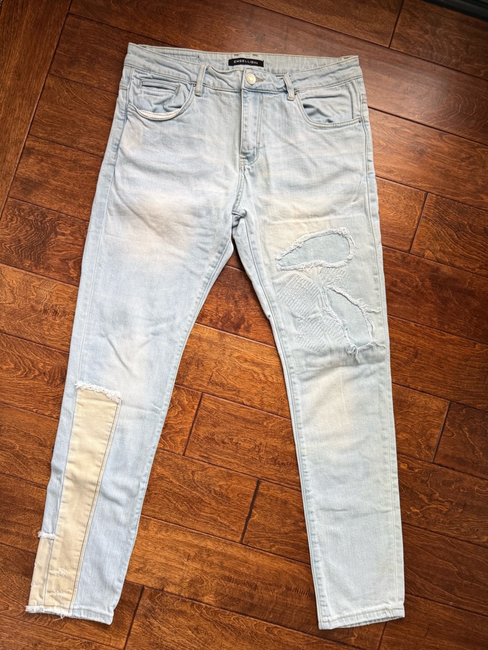 Embellish Light Wash Jeans with Contrast Stitching